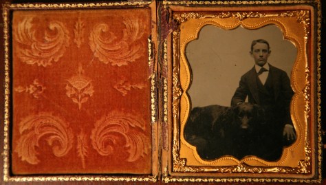 Tintype, boy and his dog.