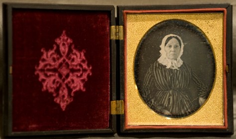 Sixth Plate Daguerreotype in Union case, anonymous lady in bonnet