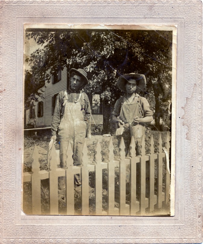 Two Men Whitewashing a Fence