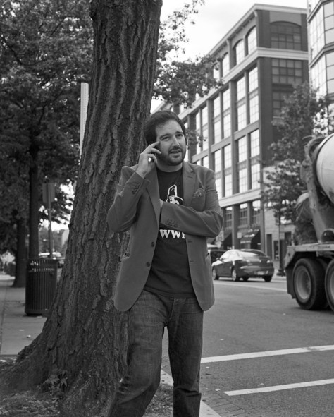 Hipster on his cellphone