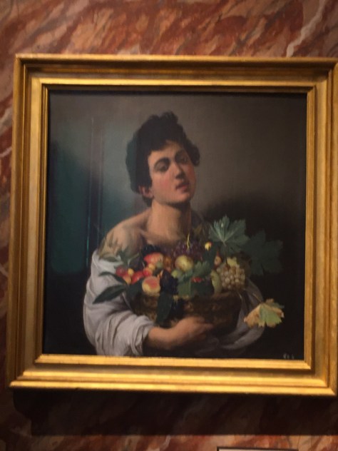 Boy with a Basket of Fruit